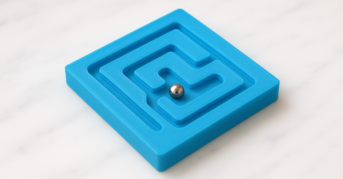 A handheld maze puzzle with a ball part way along a cut channel