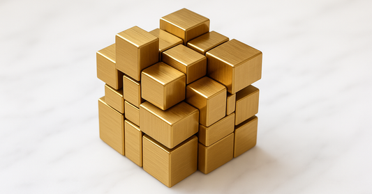 A Mirror Cube: all one gold colour with blocks of different sizes