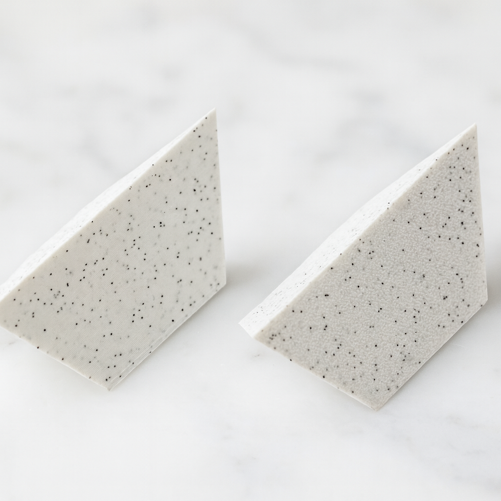 2 Piece Pyramid Puzzle mechanical puzzle on white marble surface