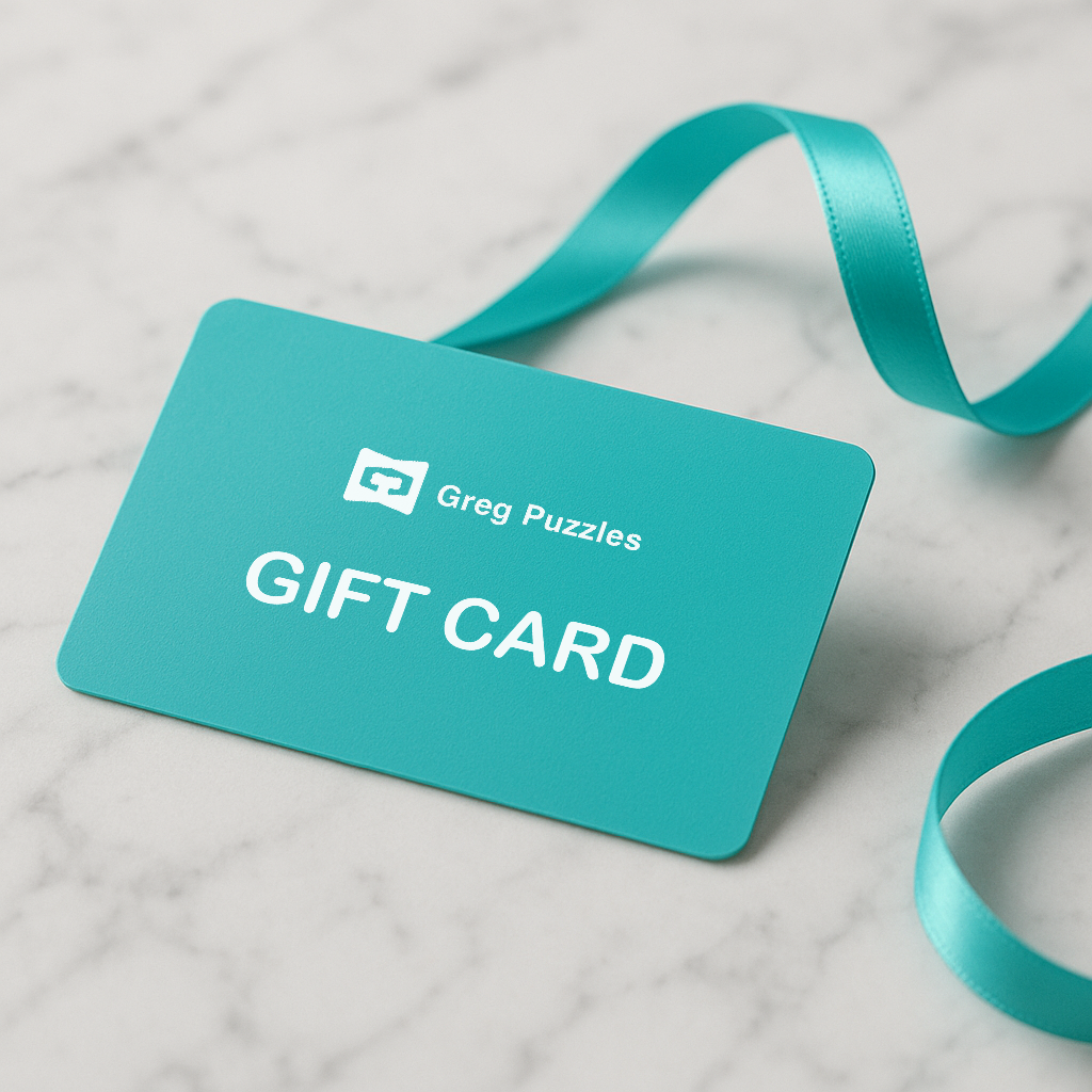 Greg Puzzles gift card in turquoise on white marble with satin ribbon