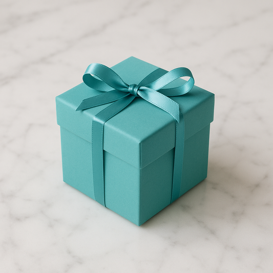 Mystery TIC wrapped gift box on white marble surface
