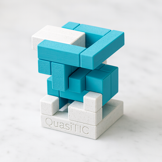 QuasiTIC mechanical puzzle on white marble surface