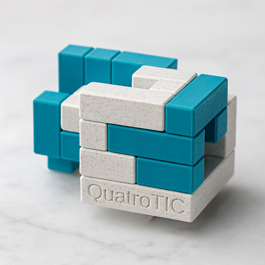 QuatroTIC mechanical puzzle on white marble surface