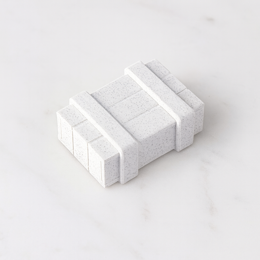 Secret Box mechanical puzzle on white marble surface