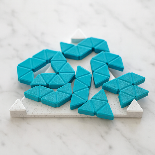 Trimini Frame mechanical puzzle on white marble surface